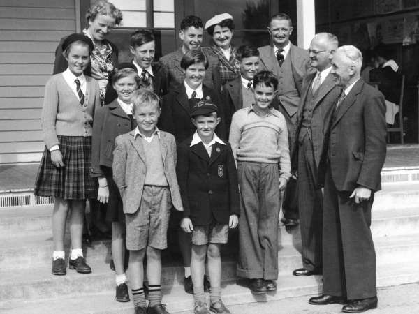 Headmaster Eric Le Petit, on the far right, is visiting a group of ākonga