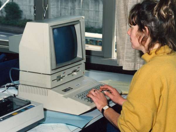 Teacher on a computer